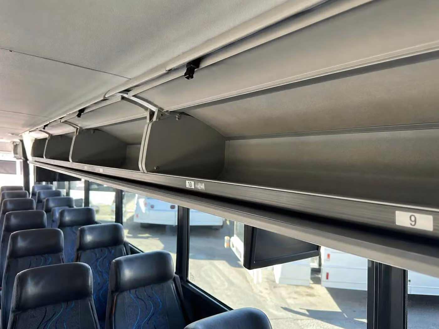 burlingame 56 passenger charter bus overhead storage
