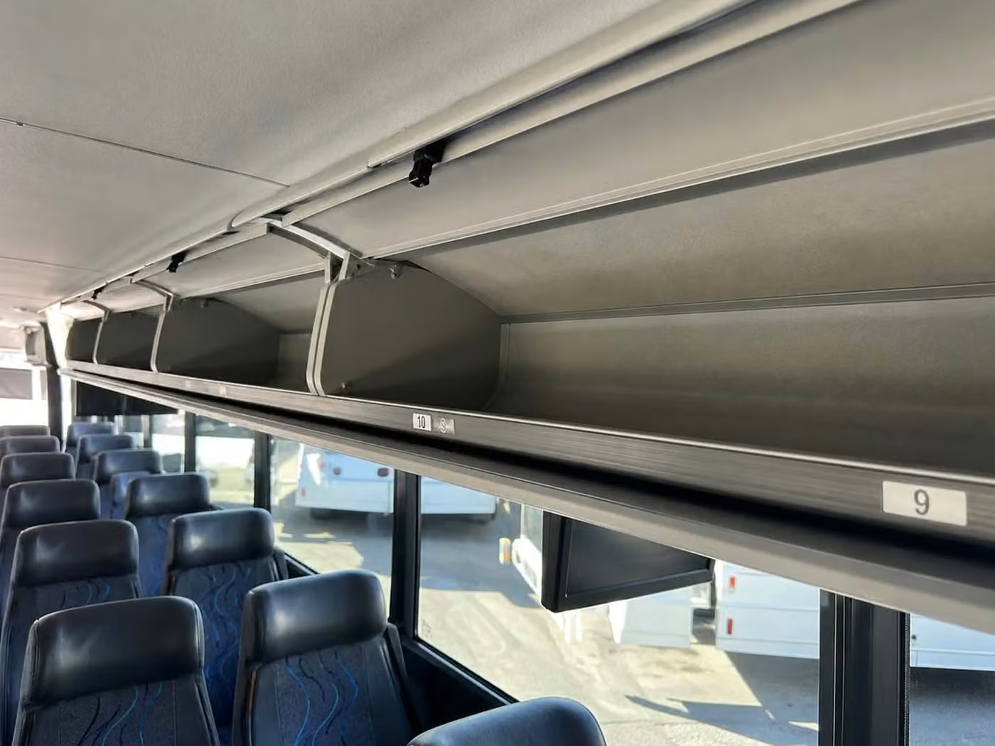 burlingame charter bus overhead storage
